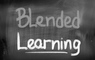 The words, Blended Learning, written in chalk on a blackboard as a concept